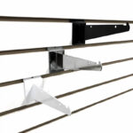 Metal shelf brackets for slatwall